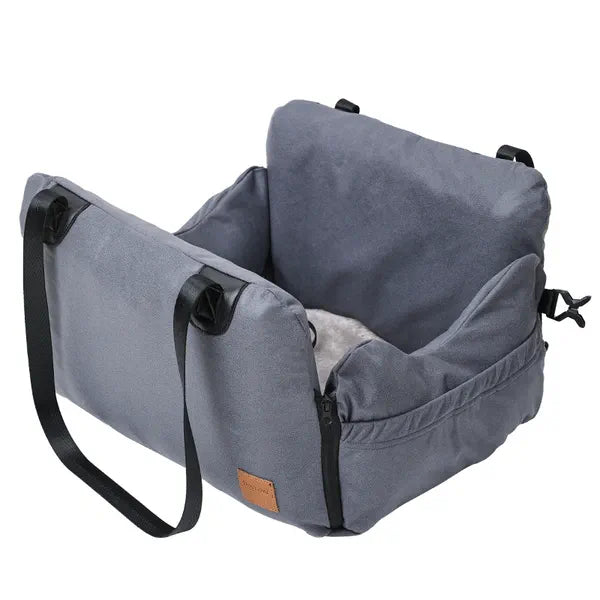 Gray Nuzzigo Everywhere Bed with carry handles, cushioned sides, and reversible mat