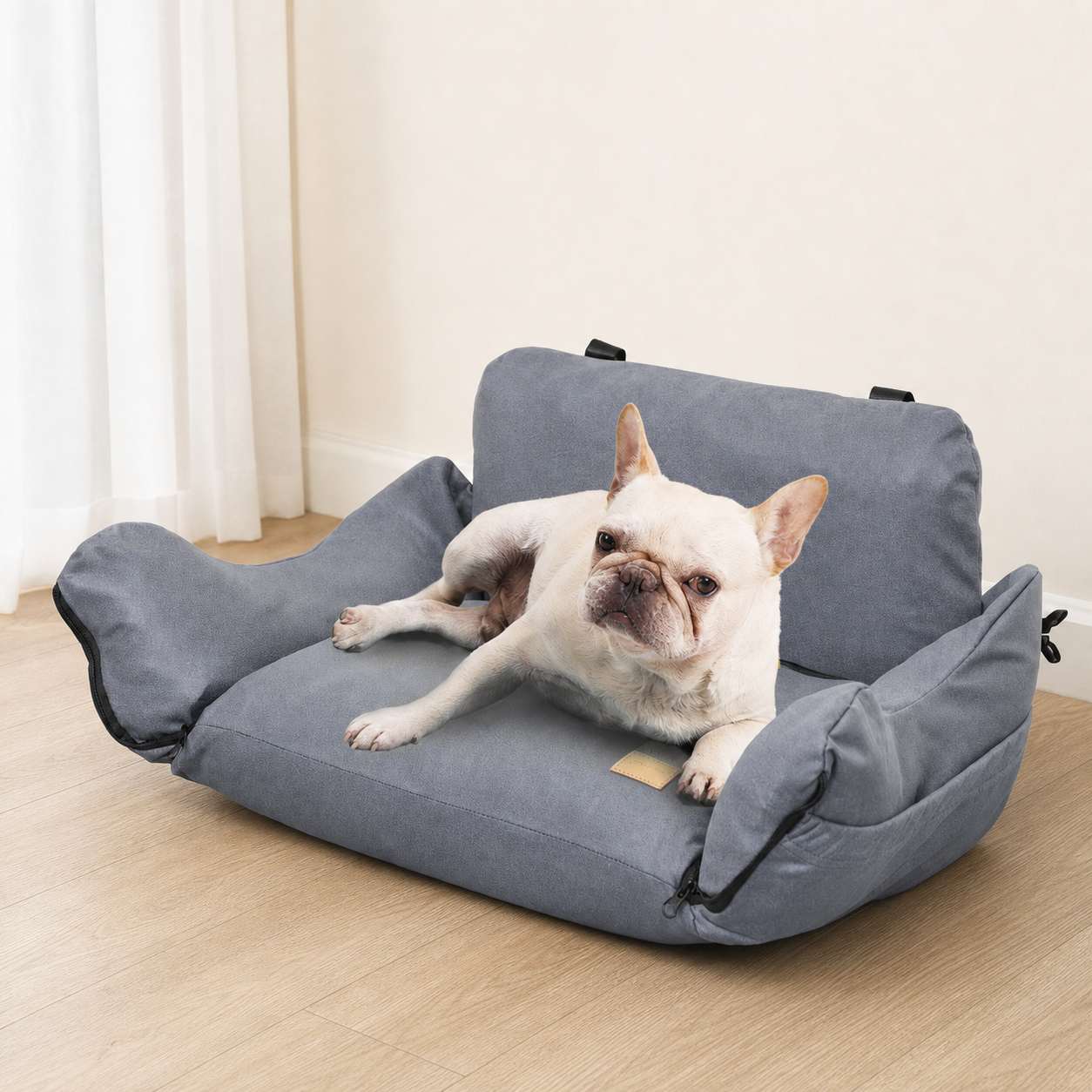The gray Nuzzigo Everywhere Bed used as a familiar resting place at home
